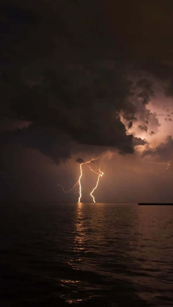 Cool Lightning Strikes Over The Water Background