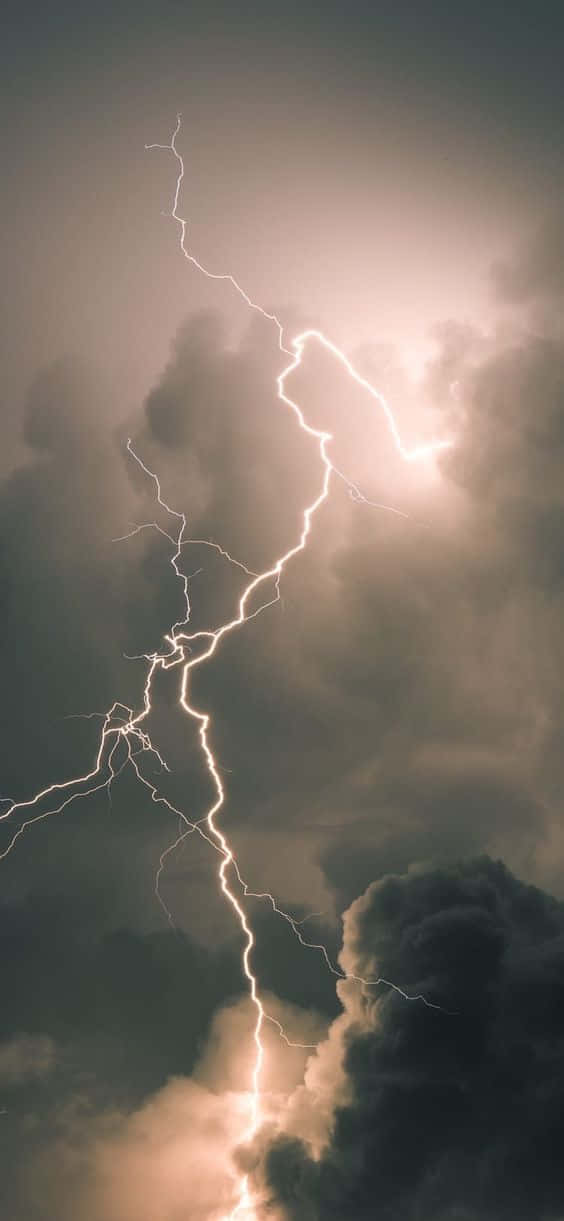 Cool Lightning Striking Through Dark Clouds Background