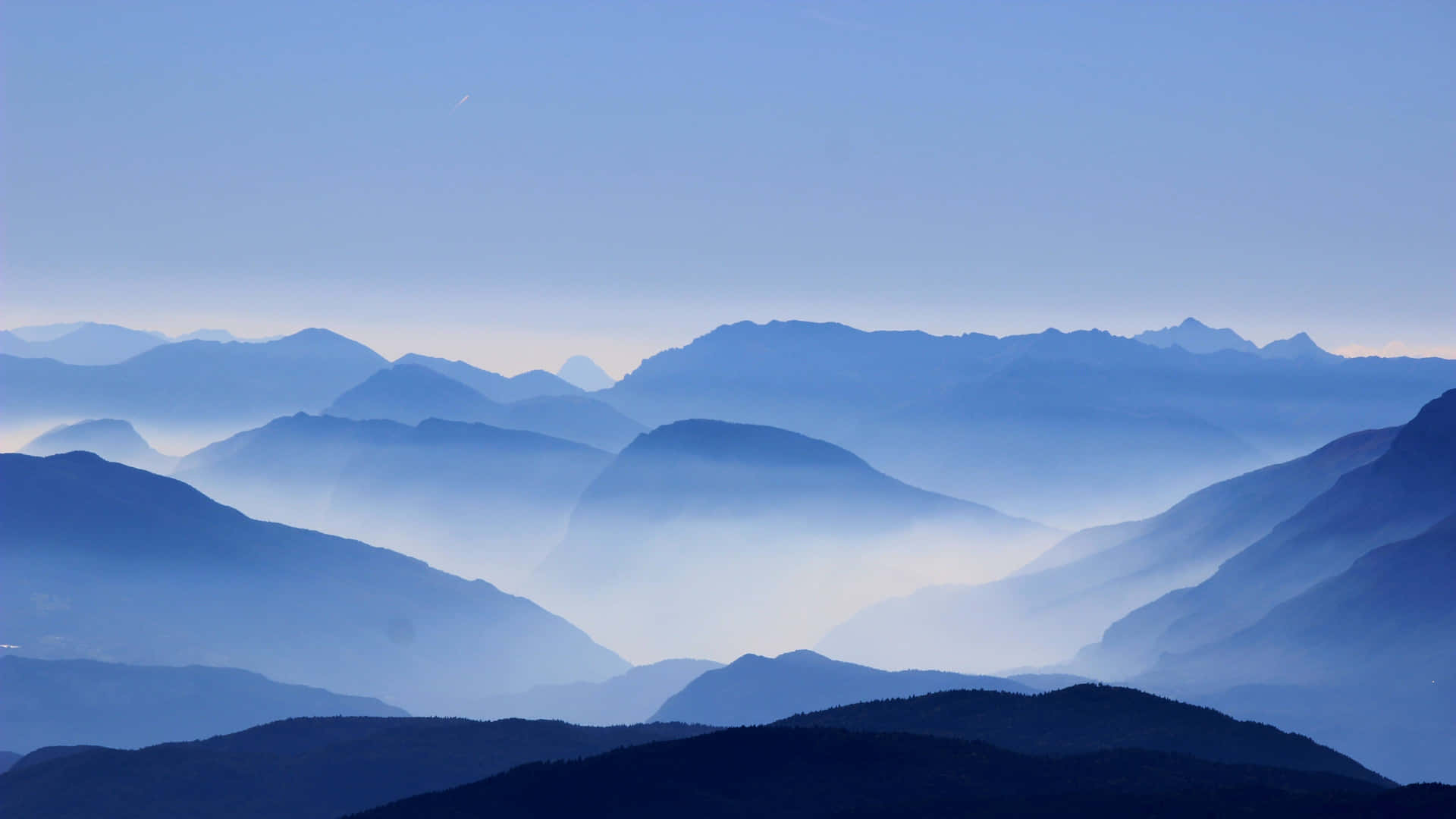 Cool Nature Foggy Mountain Range Background