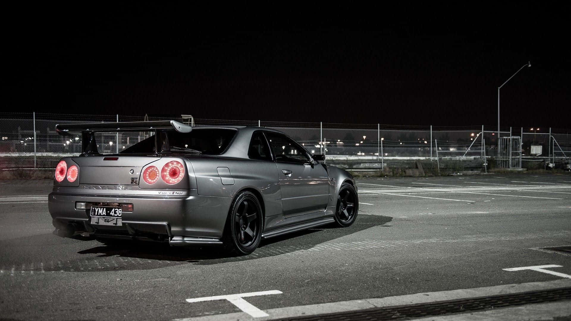 Cool Nissan Skyline Gtr In A Parking Lot Background