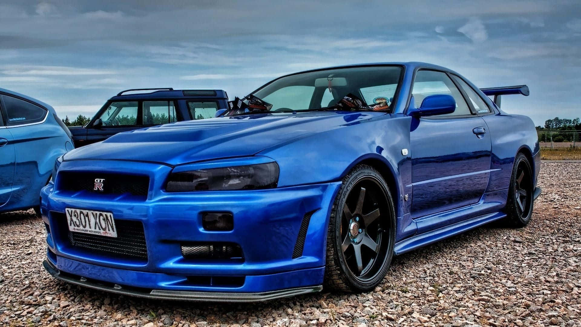 Cool Nissan Skyline Gtr With Black Rims Background