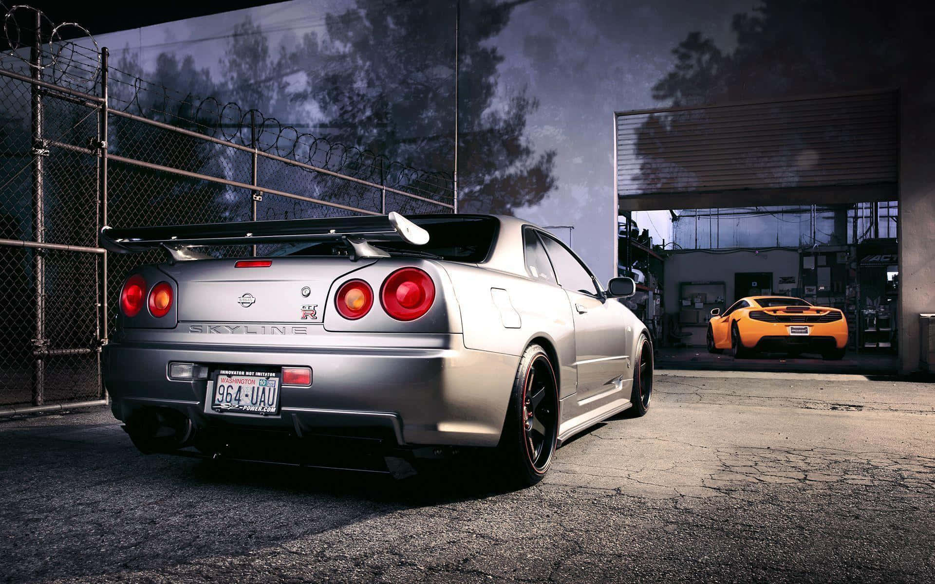 Cool Nissan Skyline With Mclaren Mp4 12c Background