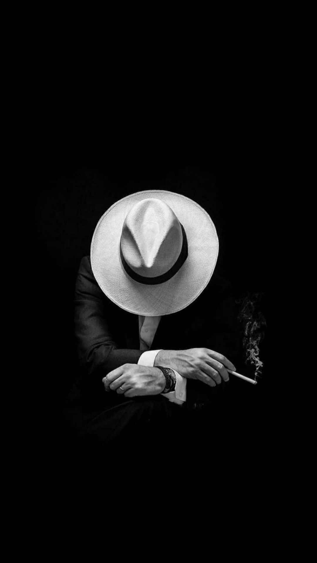 Cool Sad Boy In Stylish Fedora Background