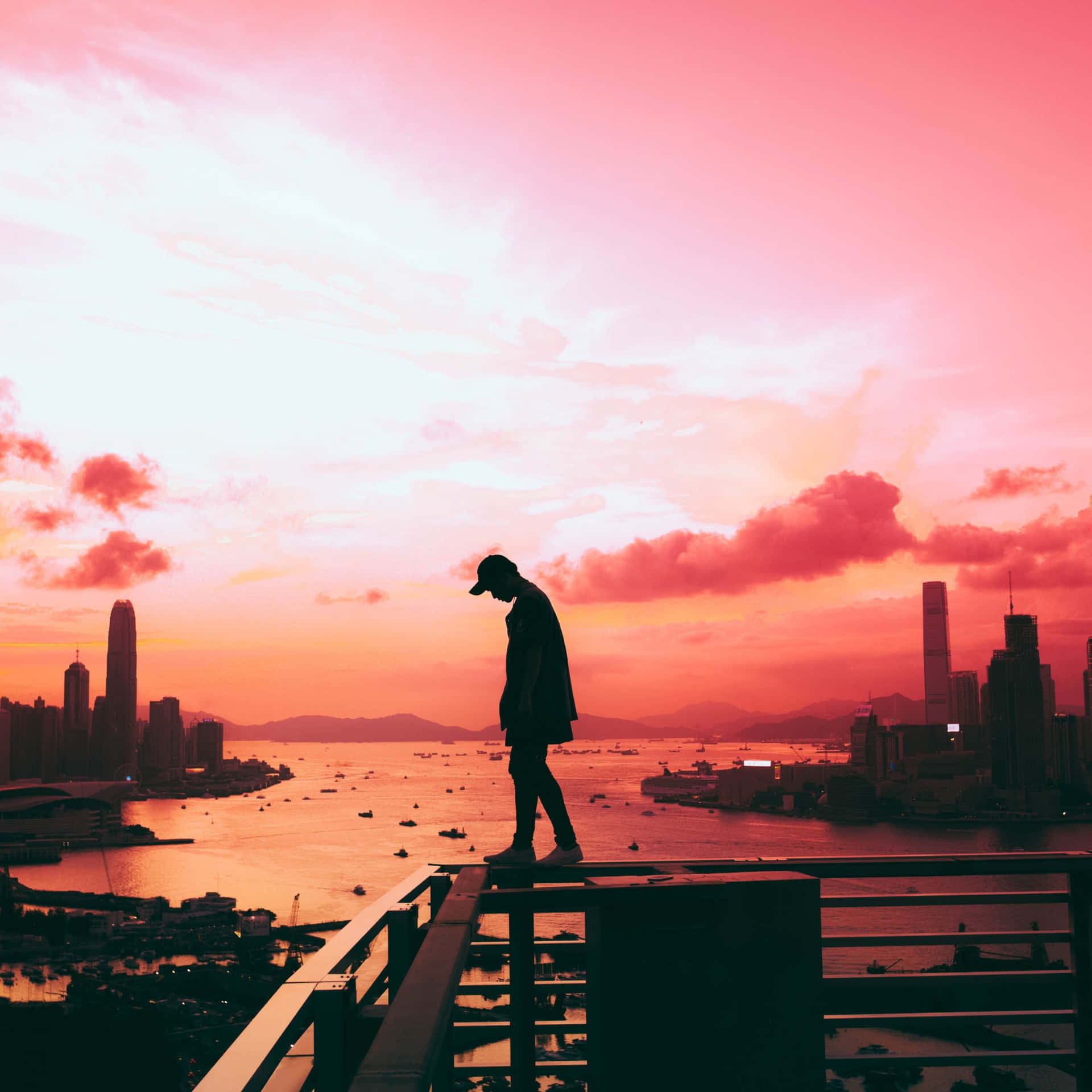 Cool Sad Boy Walking On Railings Background