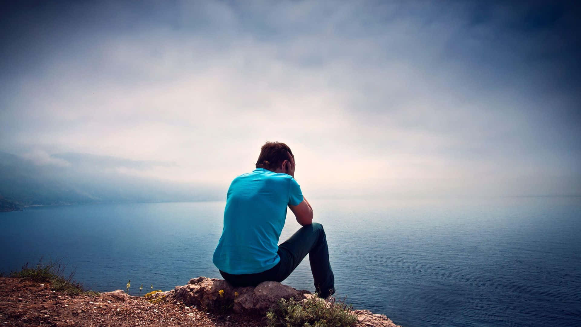 Cool Sad Boy Wearing Blue Shirt