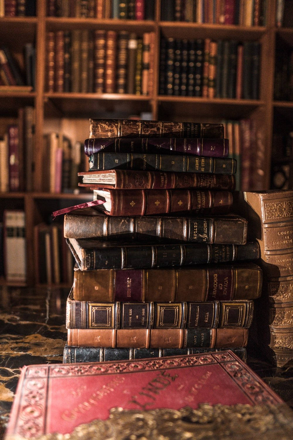 Cool Vintage Books On Table Portrait Background