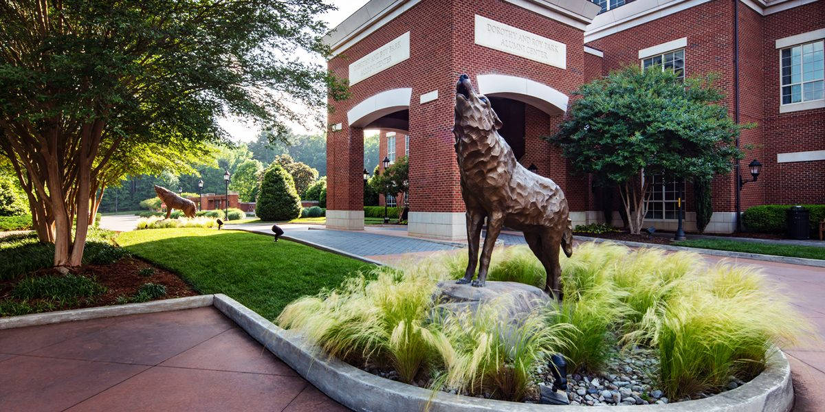 Cool Wolf Sculpture In North Carolina State University Background