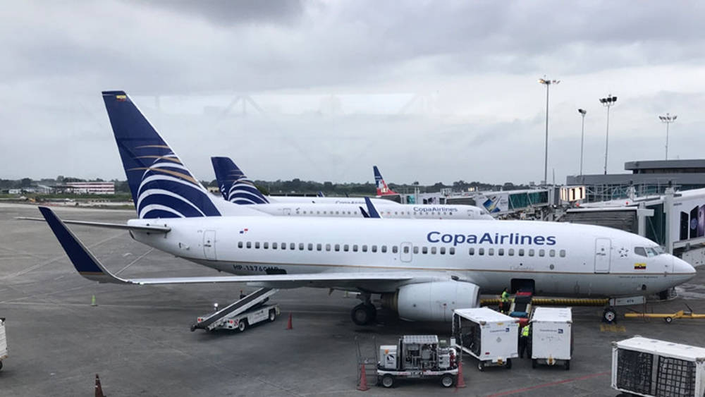 Copa Airlines Airplane In Airport Gates Background