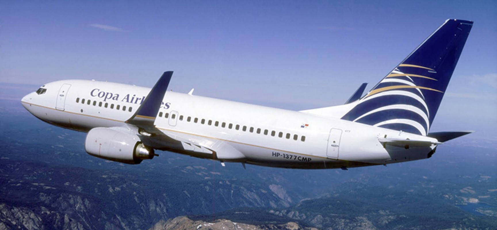 Copa Airlines Plane Above Mountain Peak Background