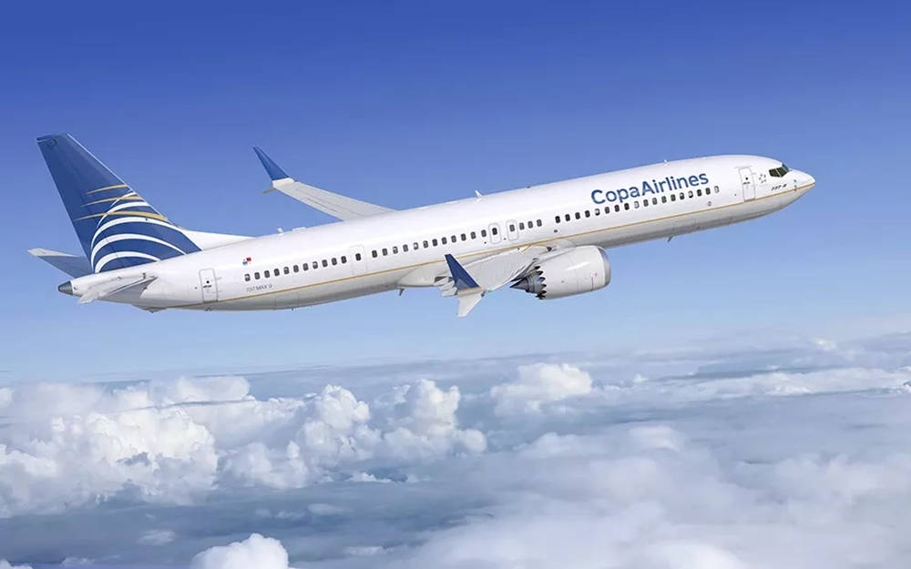 Copa Airlines Plane On Dense Clouds Background