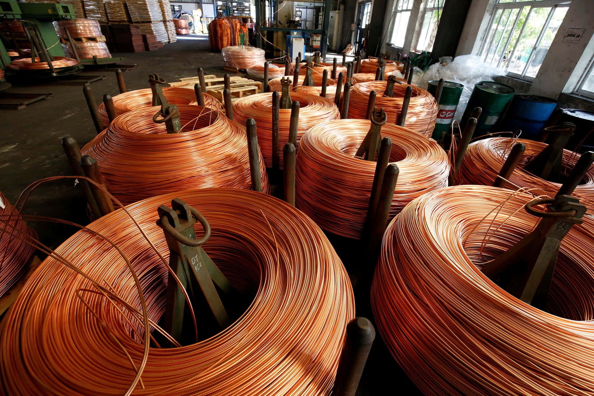 Copper Wire Coils Industrial Setting Background
