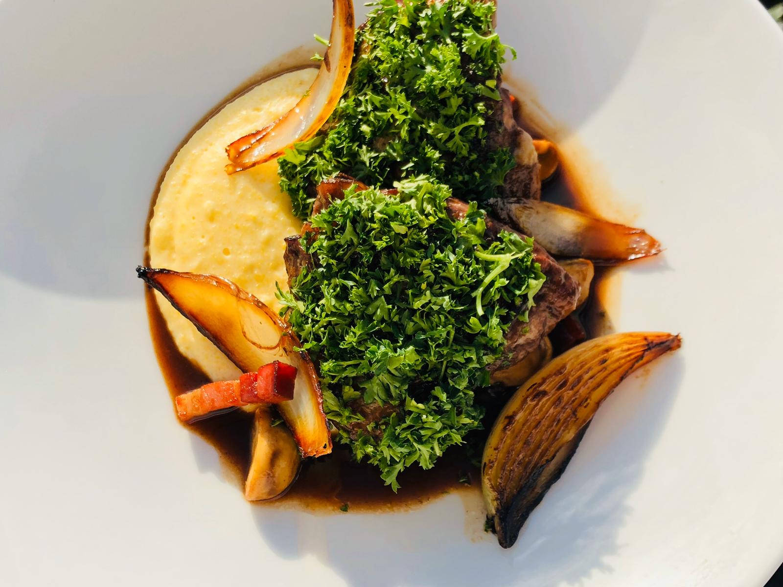 Coq Au Vin With A Plating Background