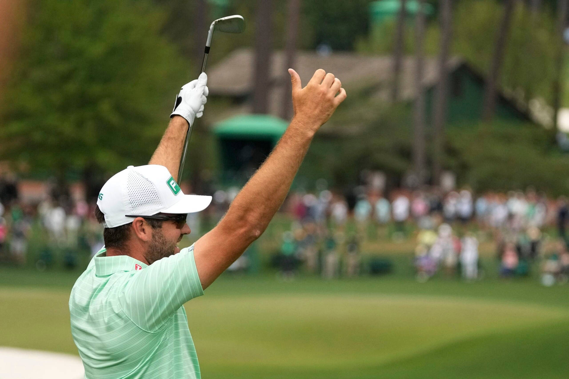 Corey Conners Raising Both Arms Background