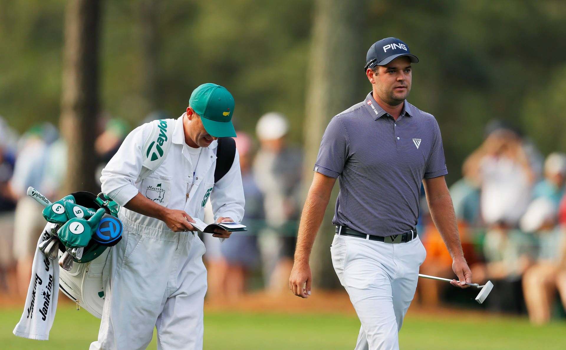 Corey Conners With His Caddie Background