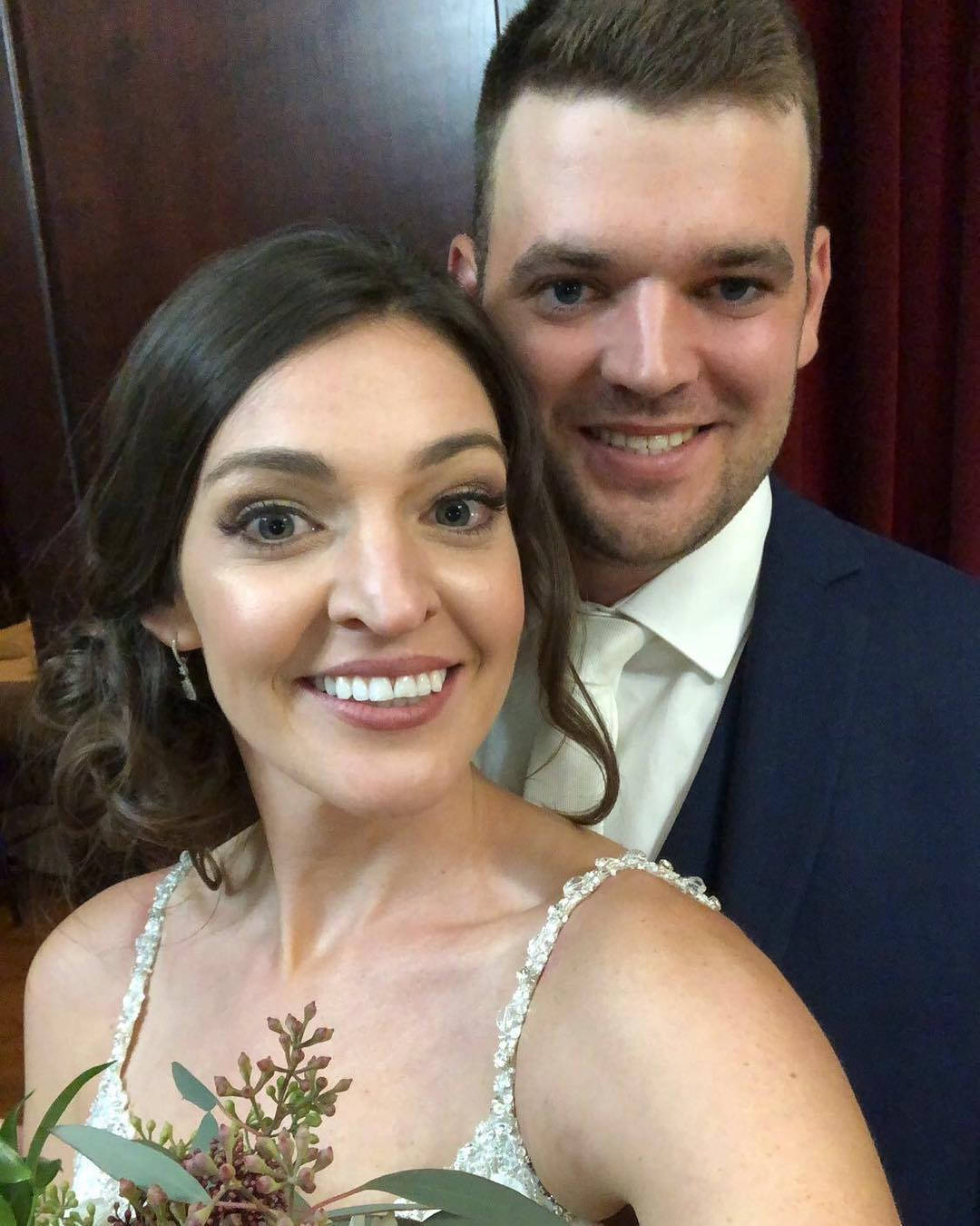 Corey Conners With His Wife Malory Conners At A Golf Event. Background