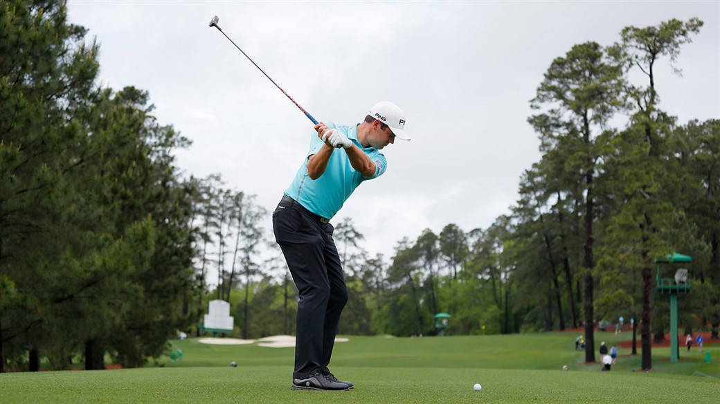 Corey Connors Swinging A Club Background