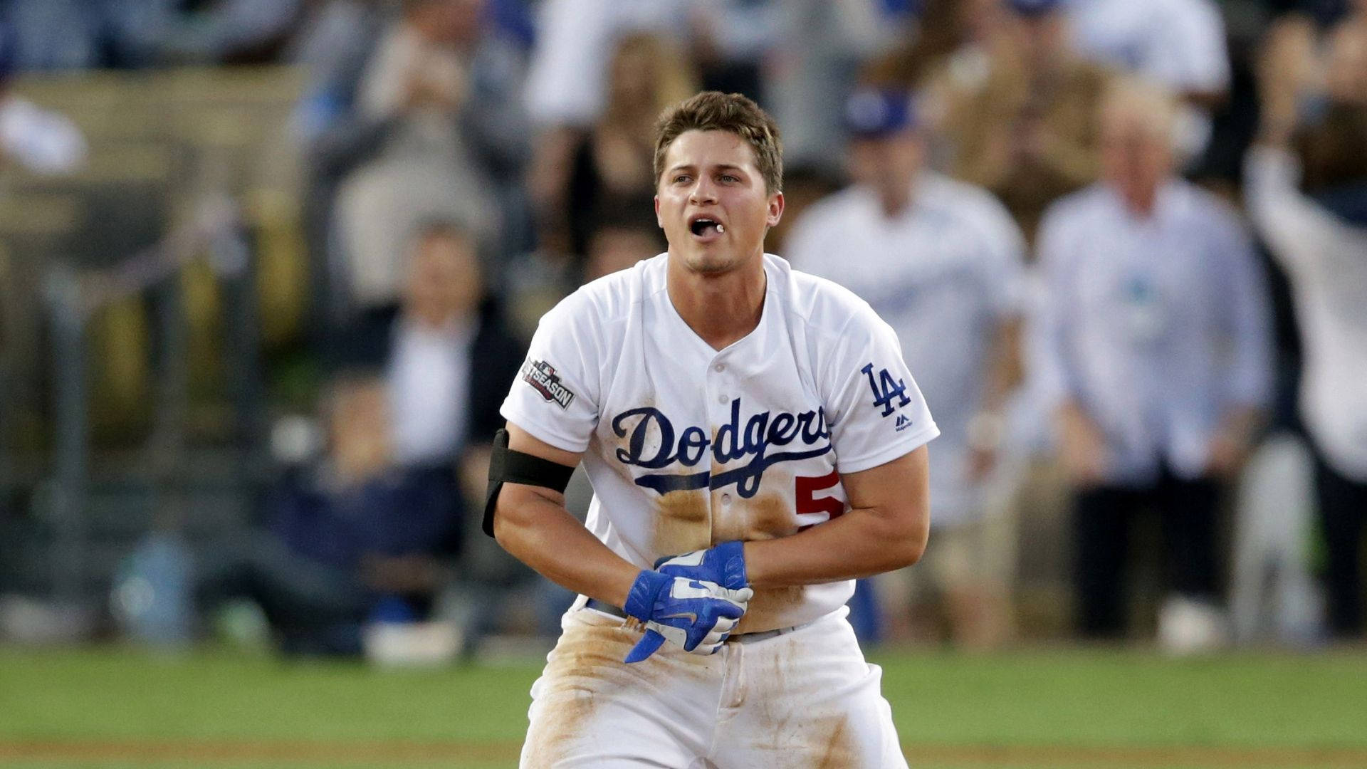 Corey Seager Crouching In Dirty Shirt Background