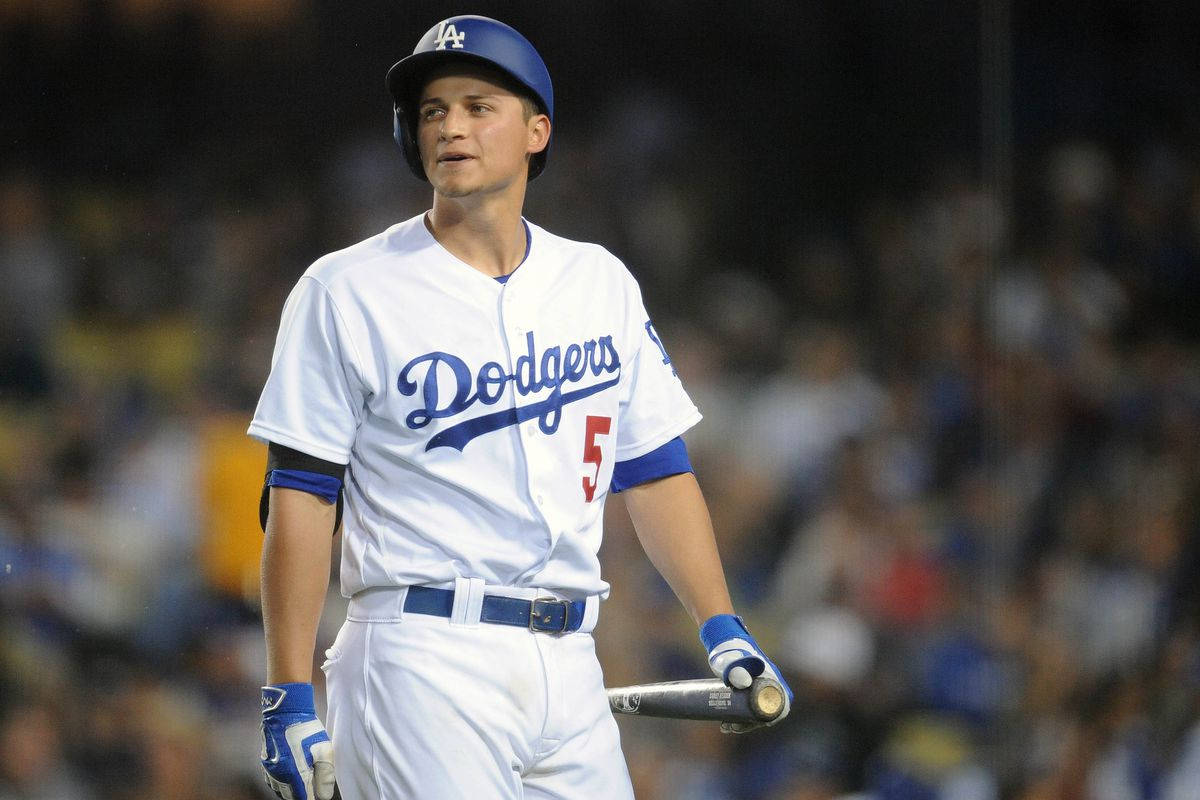 Corey Seager Holding Baseball Bat By His Side Background