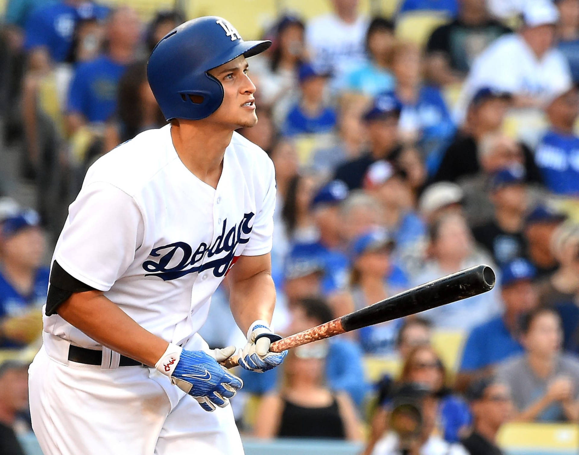 Corey Seager Holding Bat In Front Of Fans