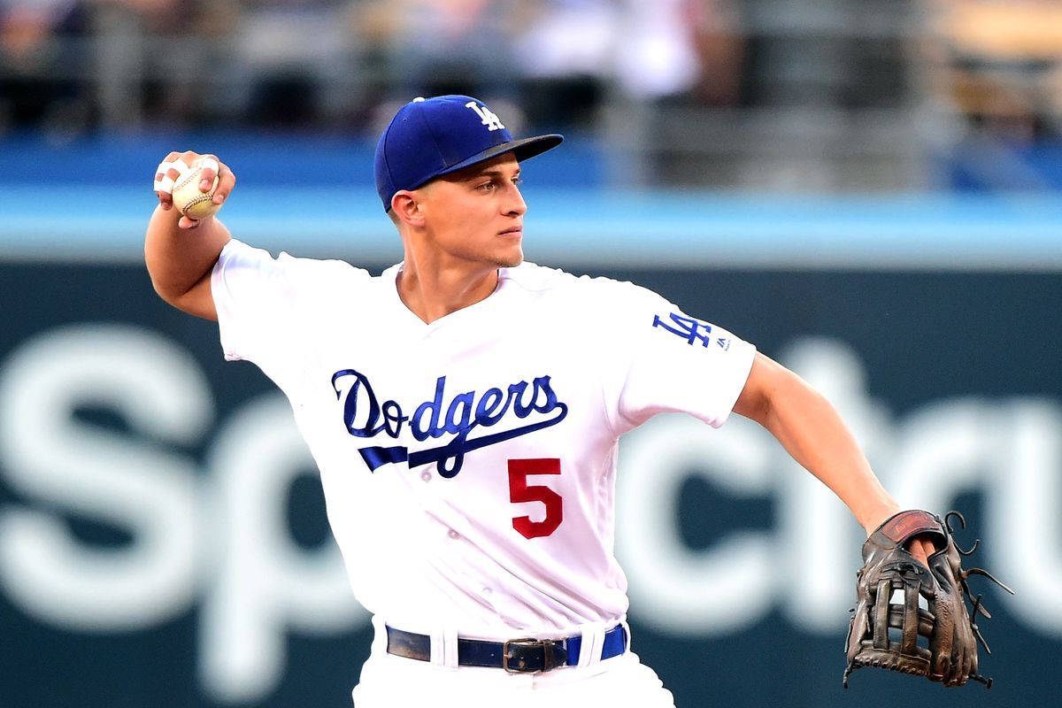 Corey Seager Profile While Throwing Ball Background
