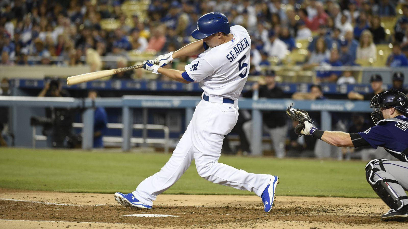 Corey Seager Swinging While Skipping Background