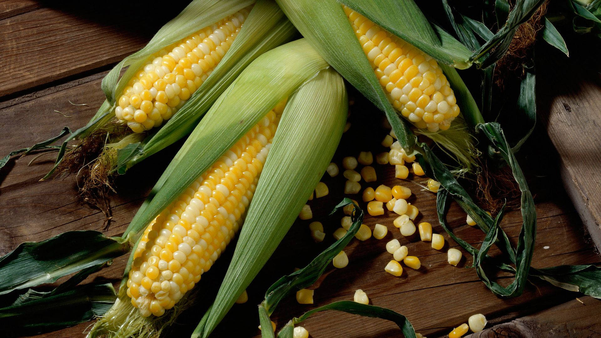 Corns On Wooden Planks Background