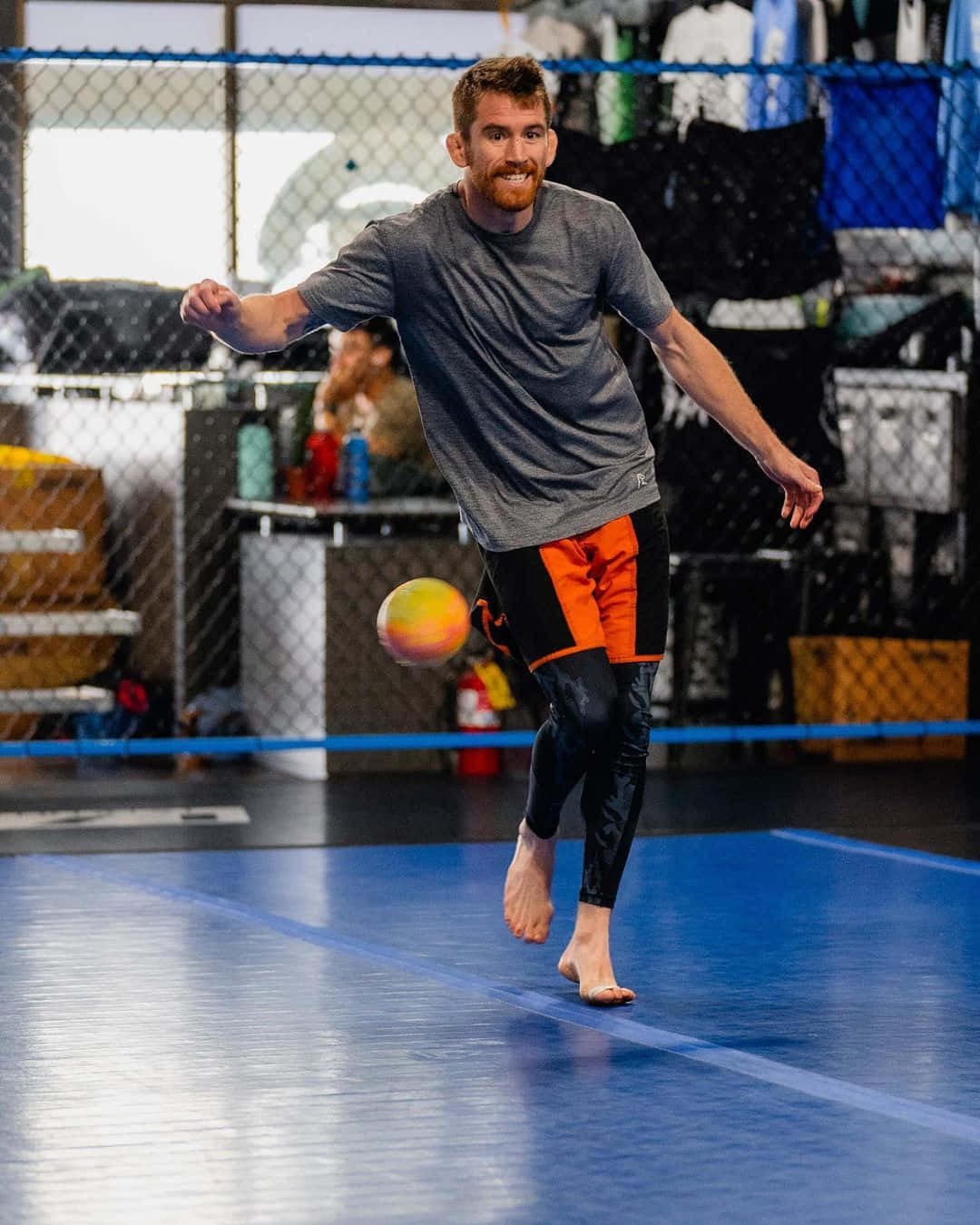 Cory Sandhagen Avoiding A Ball Background