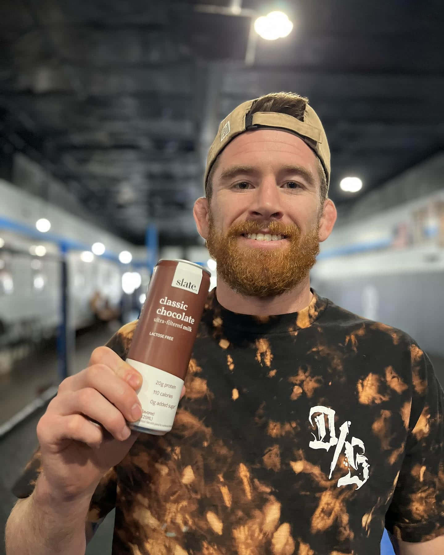 Cory Sandhagen Holding Slate Milk