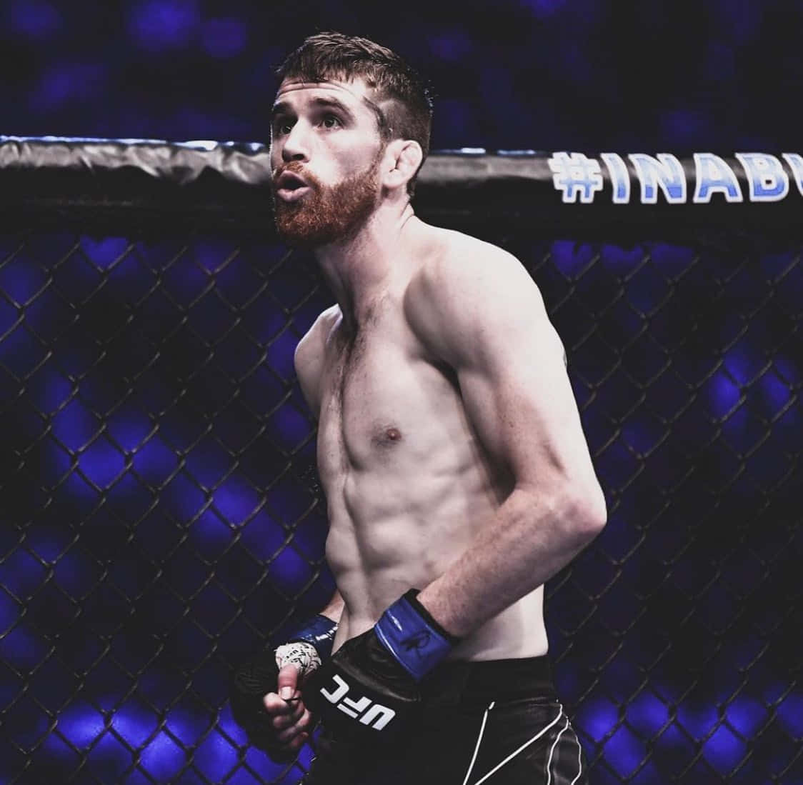 Cory Sandhagen Pouting Inside Octagon Background