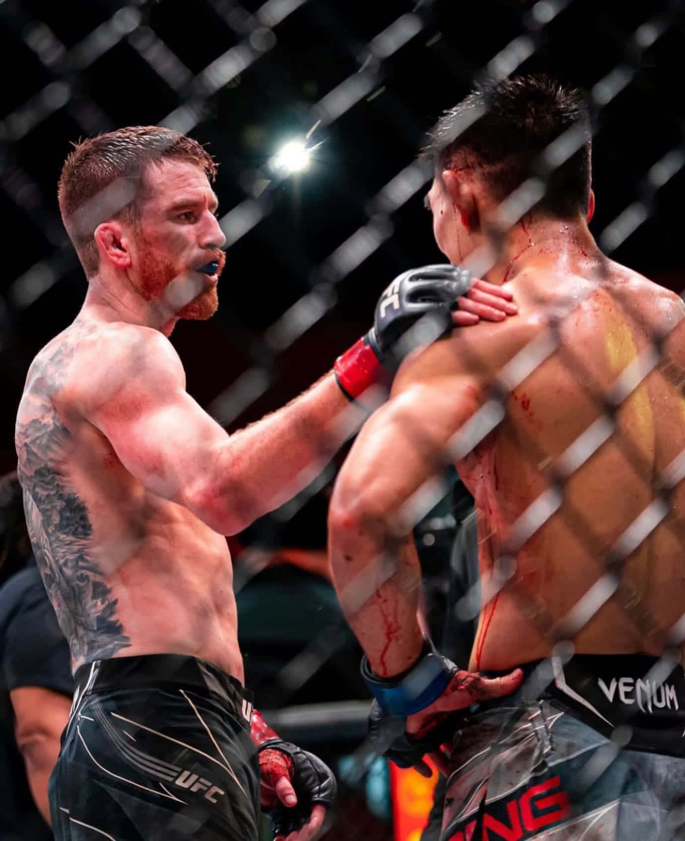 Cory Sandhagen Tapping Opponent's Shoulder Background