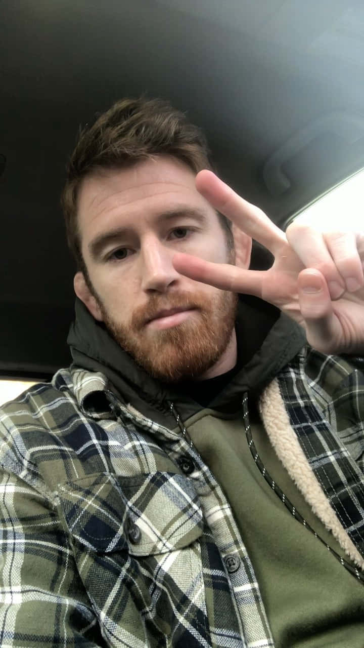 Cory Sandhagen With Peace Sign Background