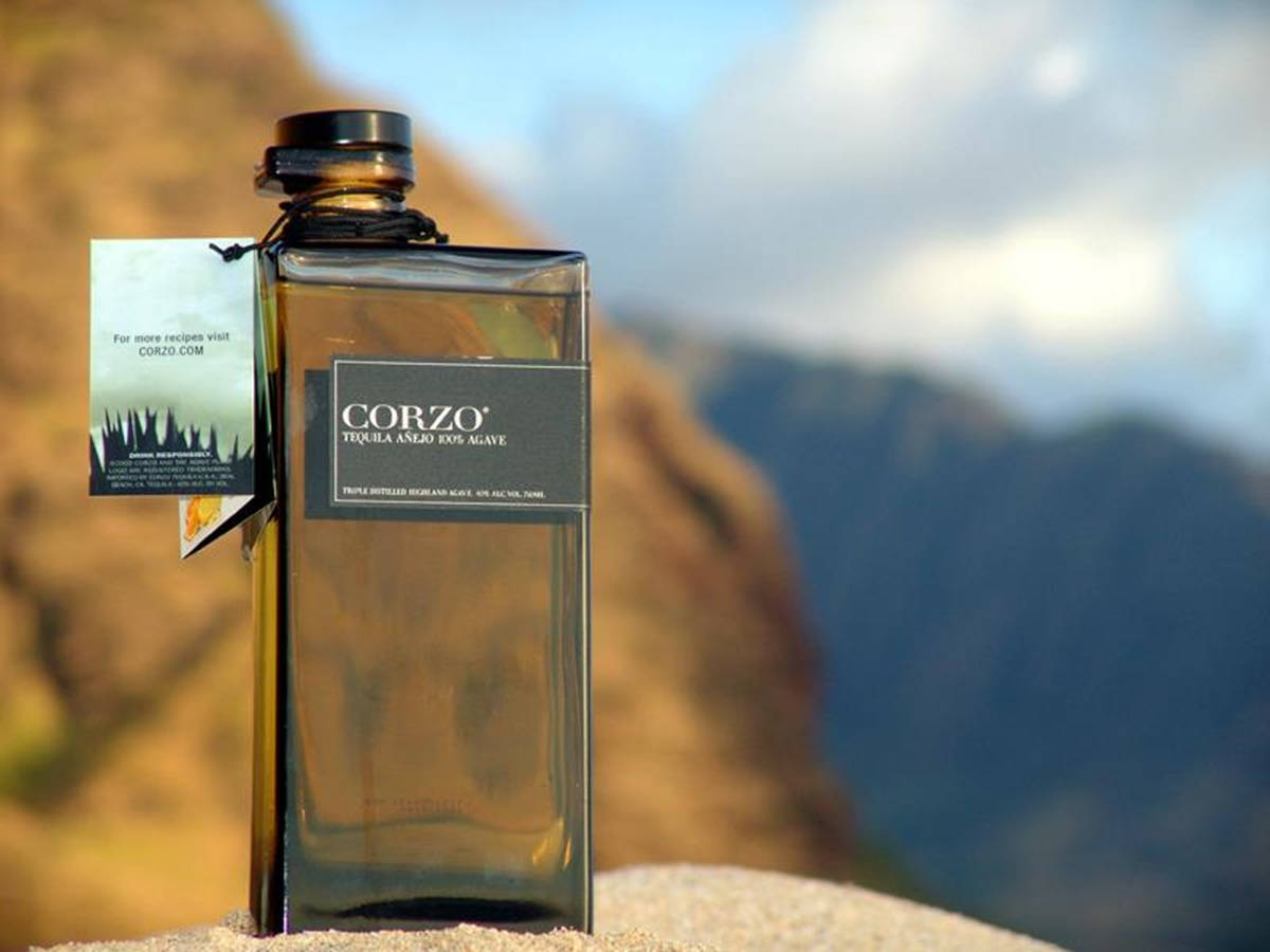 Corzo Anejo Tequila Set Against A Mountainous Backdrop Background