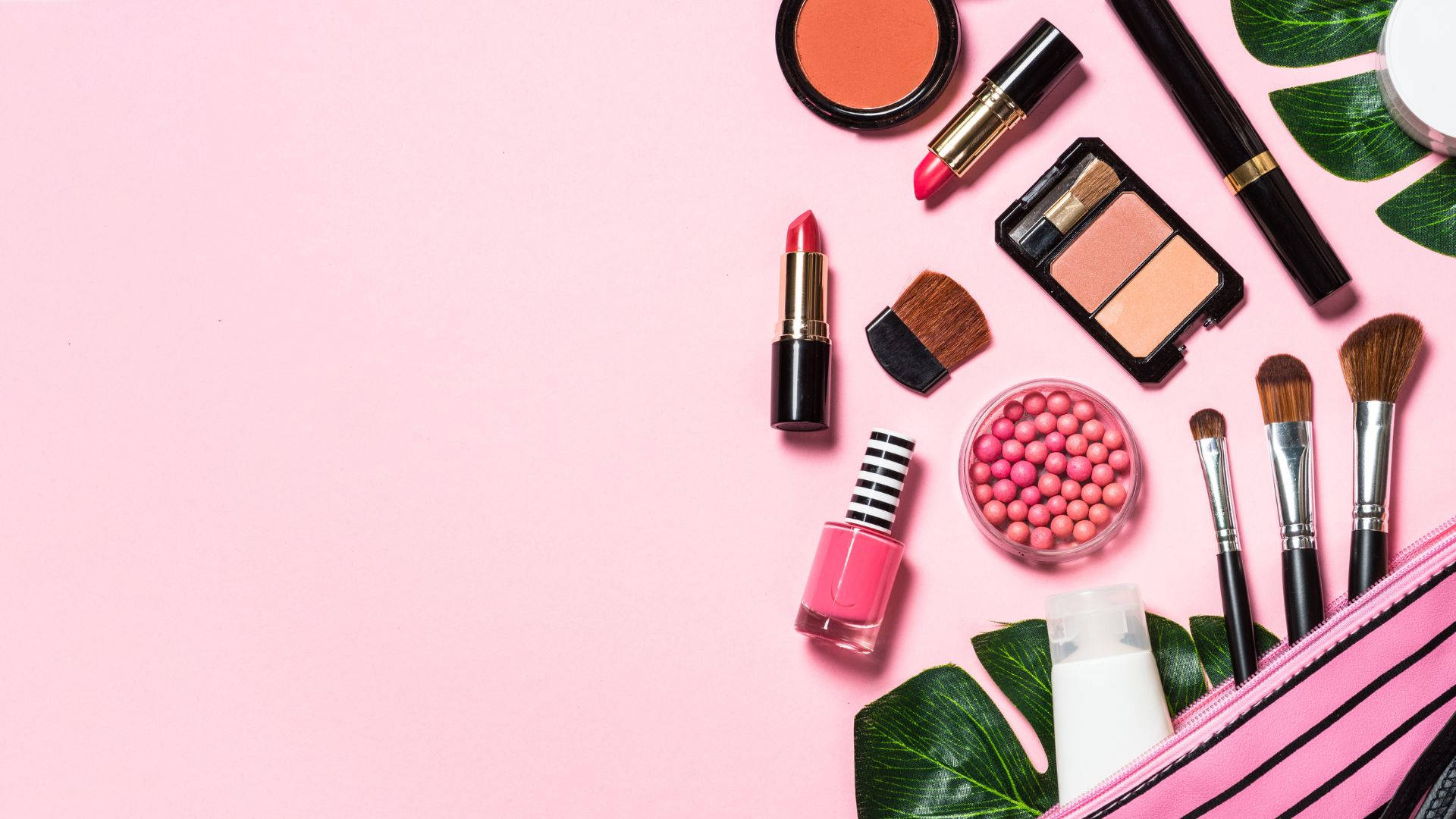 Cosmetics On Baby Pink Surface Background