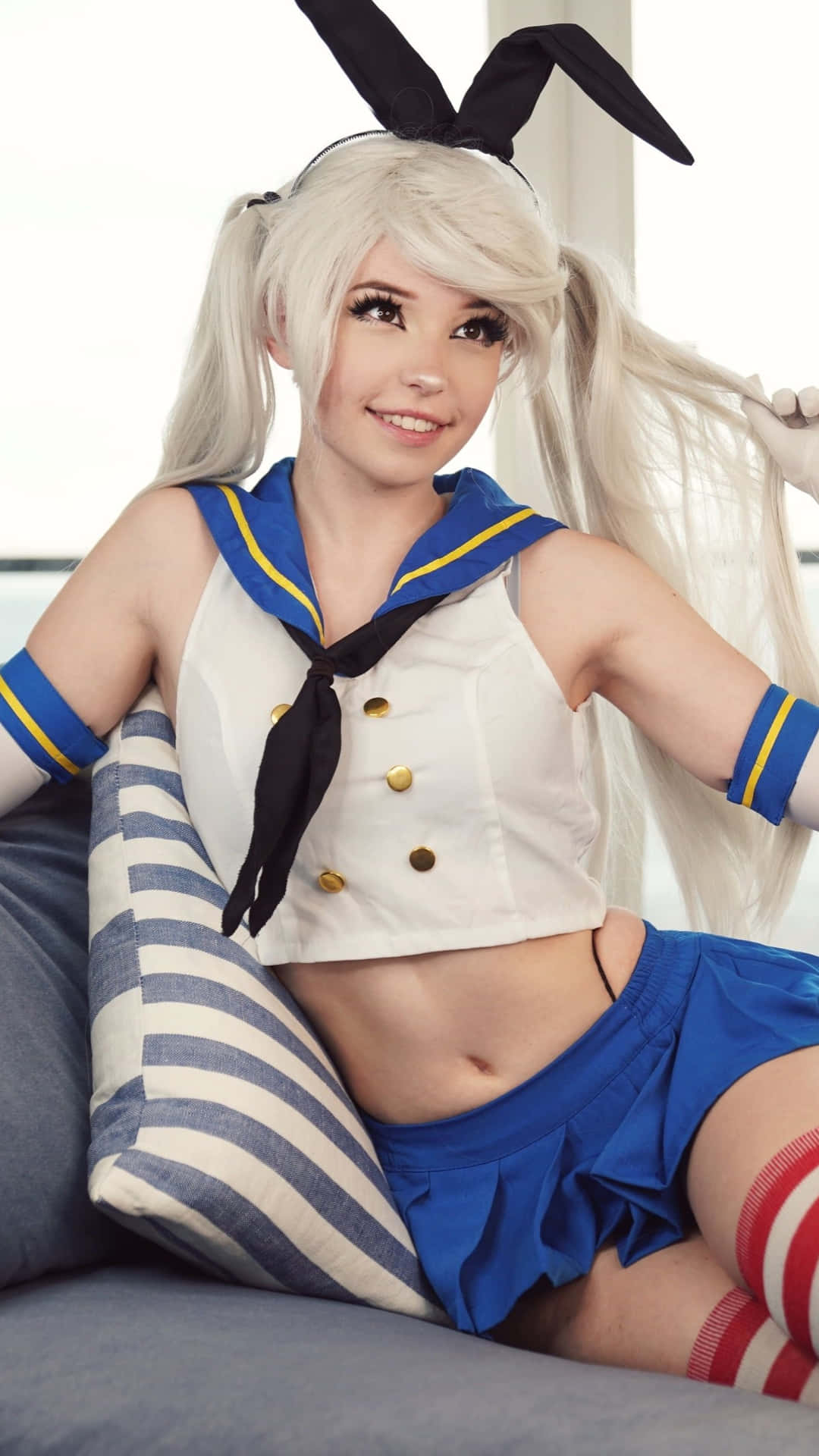 Cosplay Modelin Sailor Outfitwith Bunny Ears