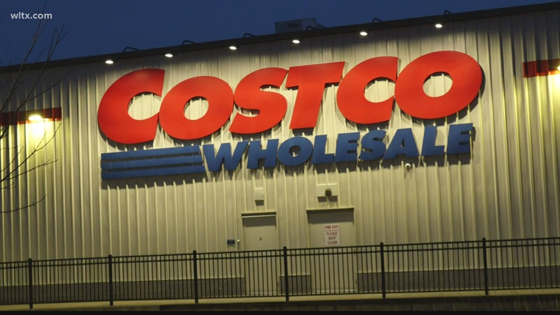 Costco Wholesale Signage With Lights Background