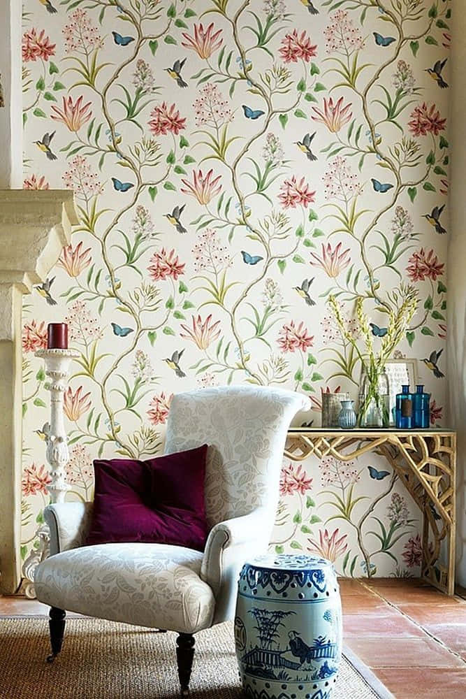 Couch Against A Wall With Subtle Design Of Flowers Background