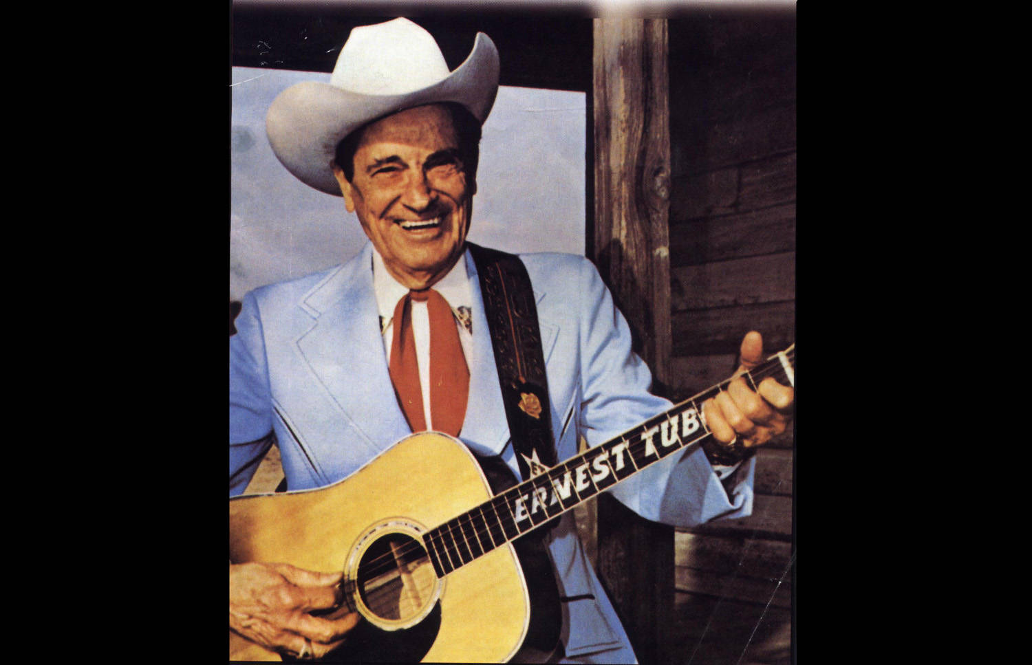 Country Music Icon Ernest Tubb In Performance Background