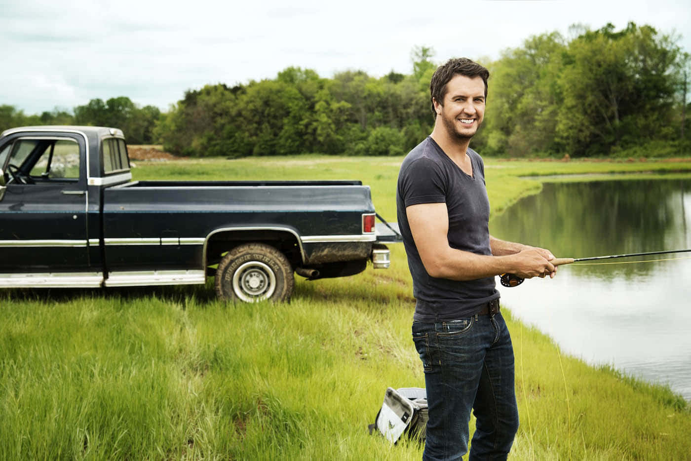 Country Music Star Luke Bryan In Concert Background