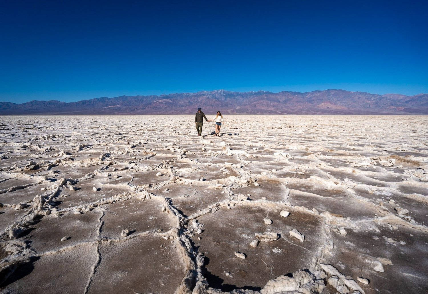 Couple At Badwater Basin Death Valley