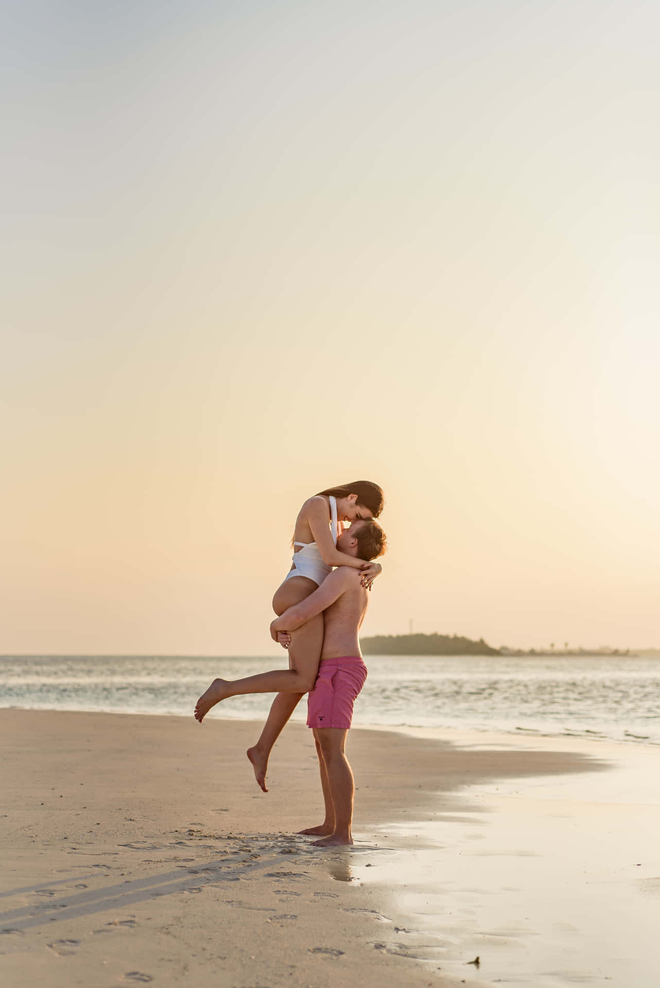 Couple At Beach In Exuma Background