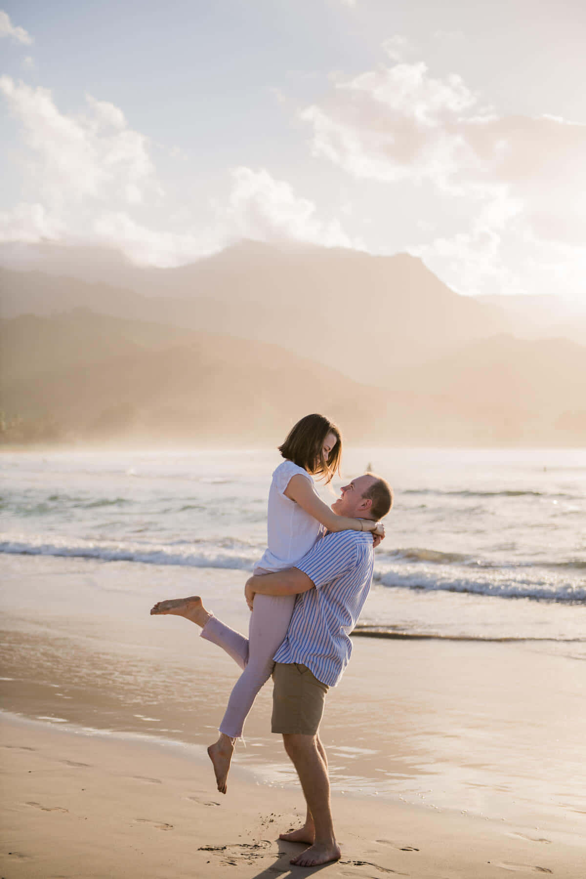 Couple At Beach In Kauai Background