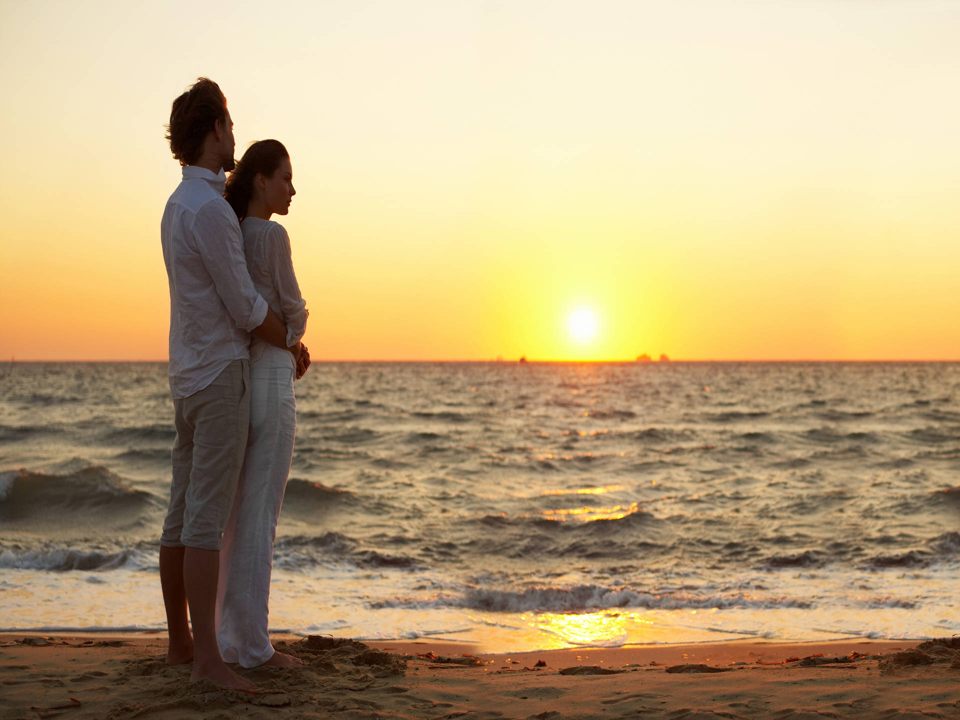 Couple At Beach Kerala Sunset Background