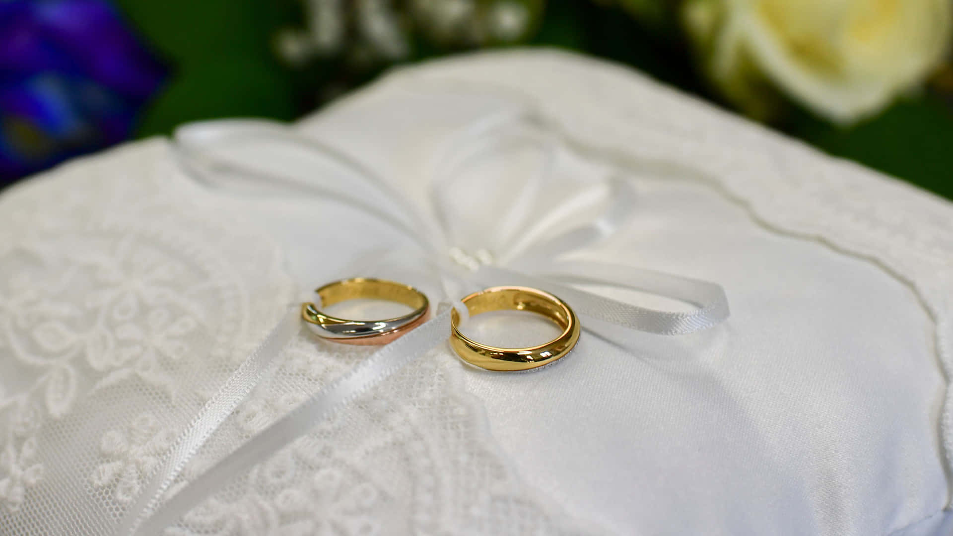 Couple Engagement Gold Rings Display Background