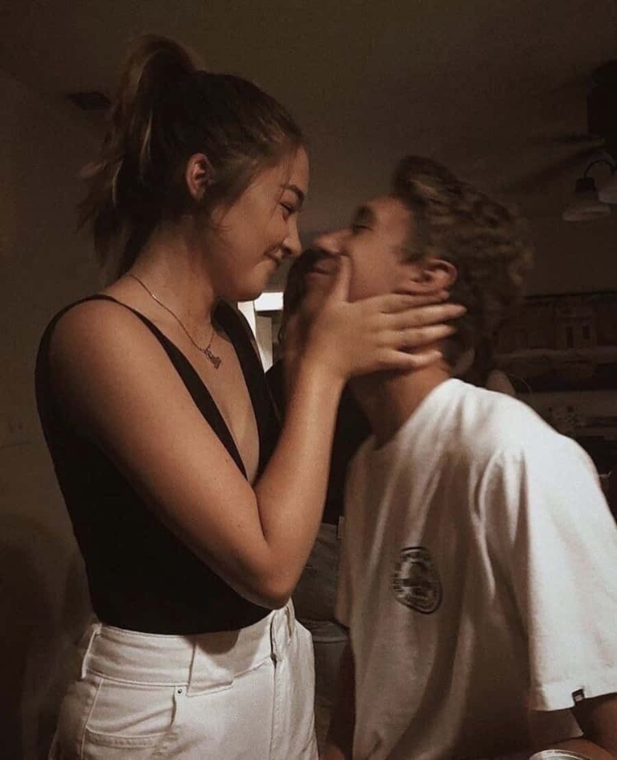 Couple Enjoying A Romantic Moment Together Background