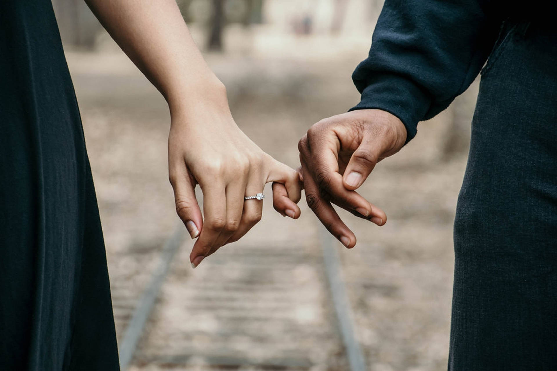 Couple Hands Pinkies Crossed Background