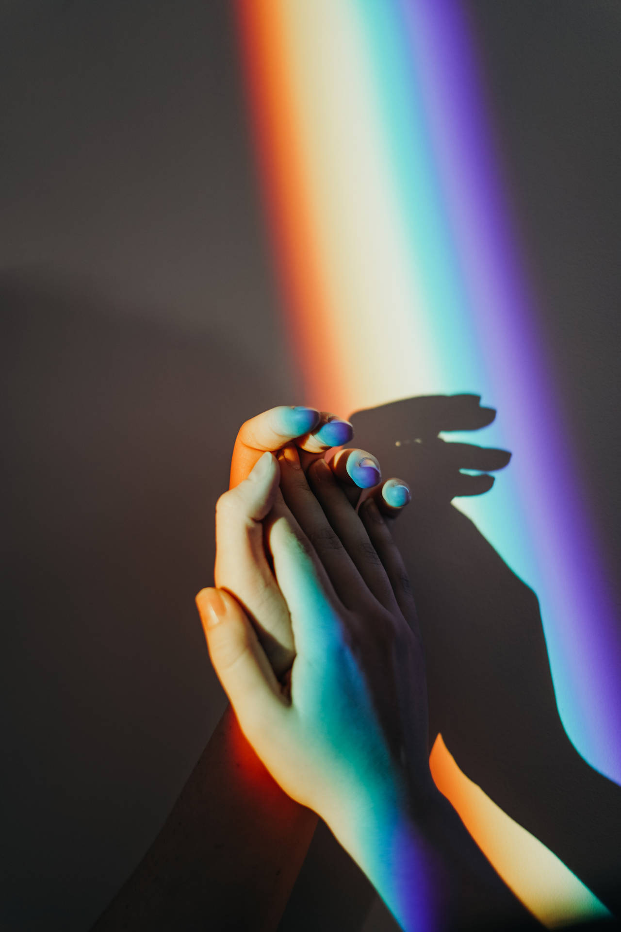 Couple Hands Rainbow Light Background