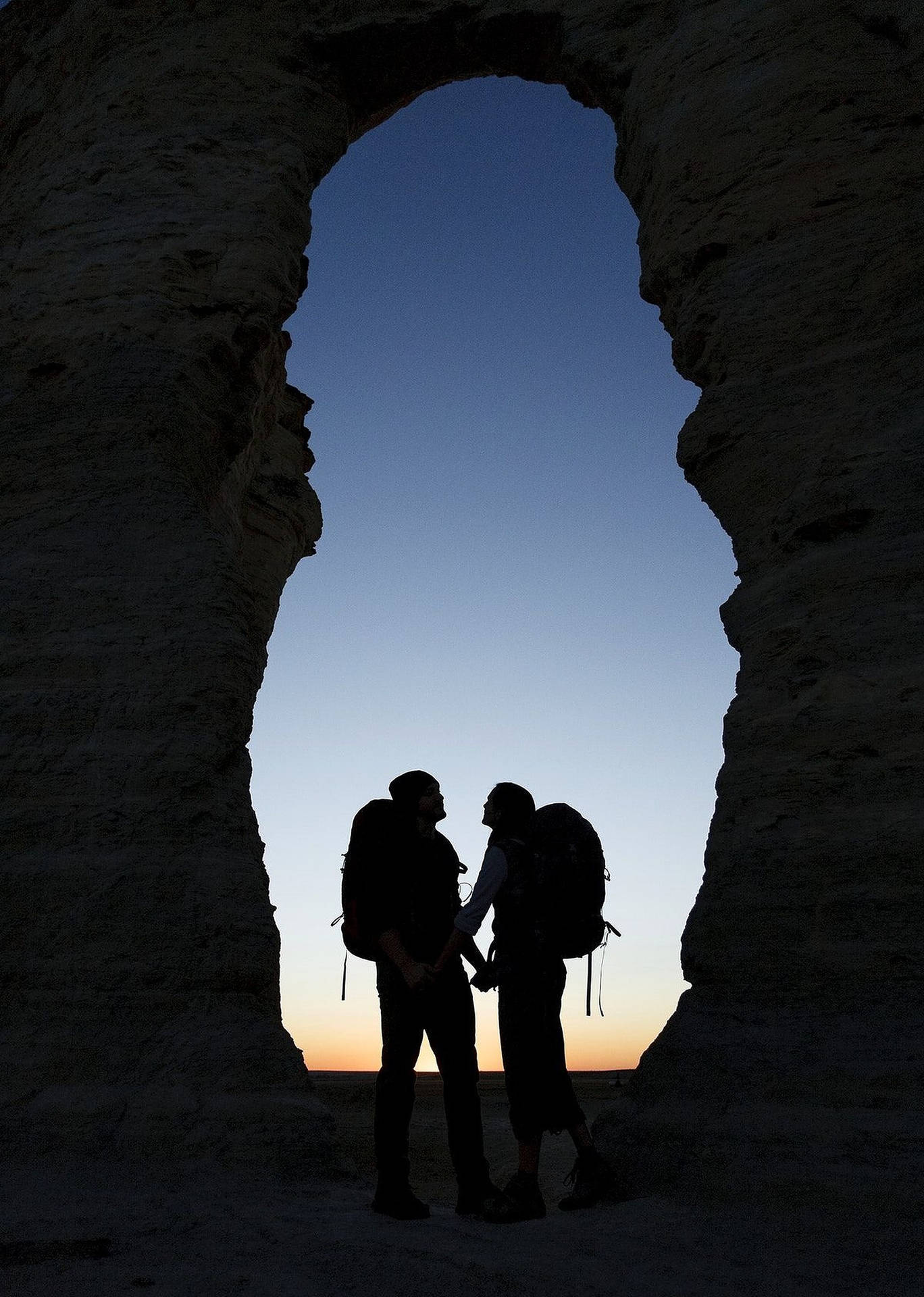 Couple Hiking Silhouette Background