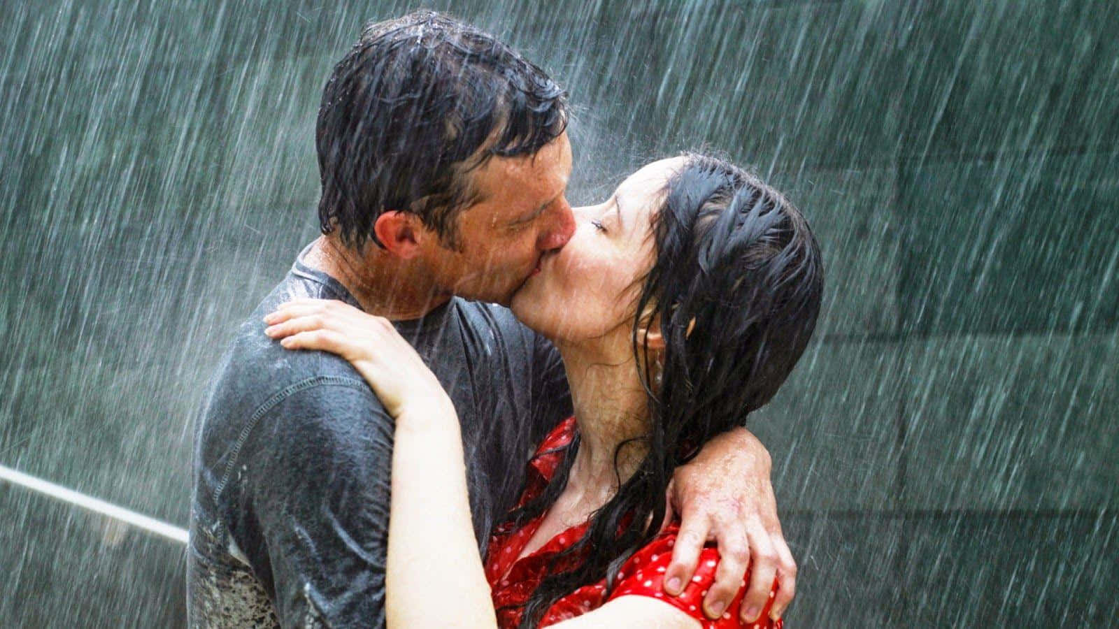 Couple Kissing Each Lips While Raining Background