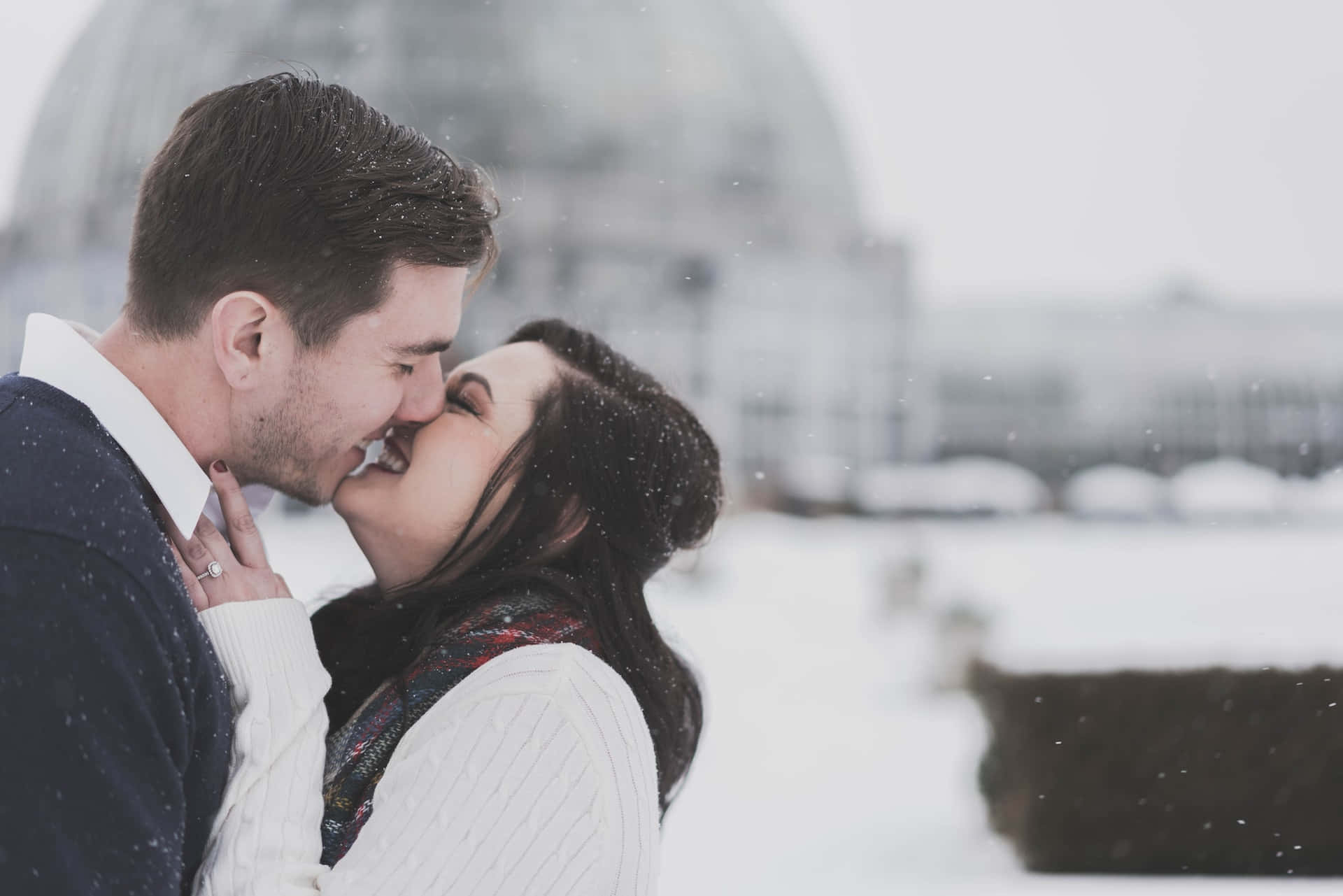 Couple Kissing Lips On Snow