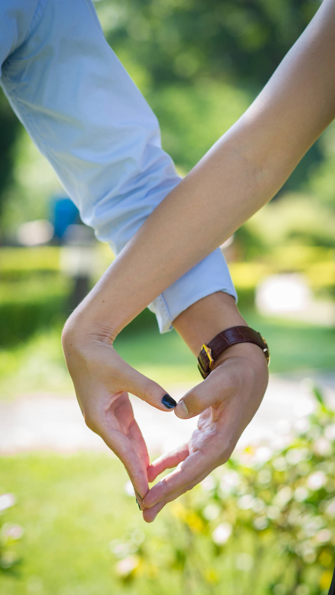 Couple Making Finger Heart